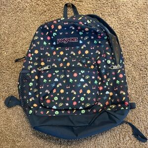 Jansport Black Backpack with Colorful Floral Design